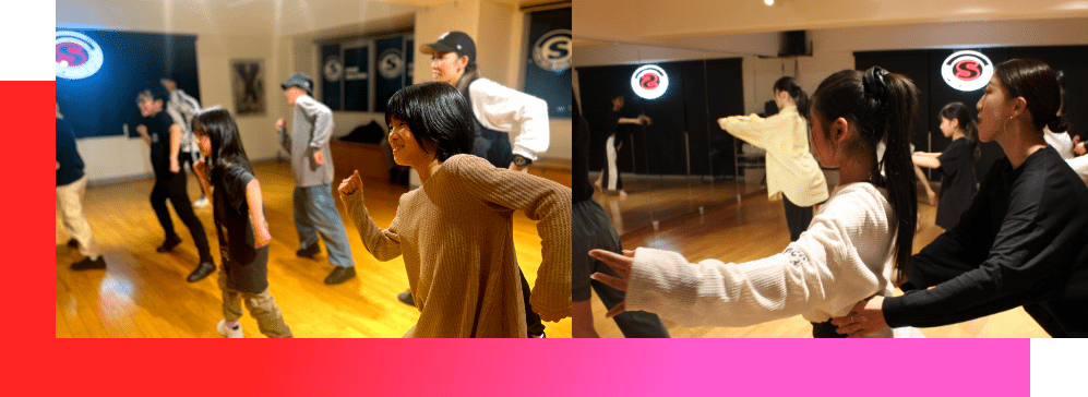 ダンスを踊る子どもたちと先生にサポートされて鏡の前で踊る女の子